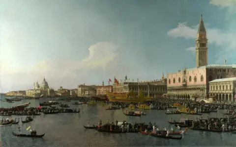La Serenissima in festa: gondole e imbarcazioni affollano il bacino di San Marco, con il Palazzo Ducale e la Basilica a fare da sfondo a un tripudio di colori e vita.
